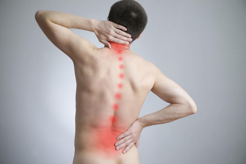 man suffering from back pain in Ft. Lauderdale, FL